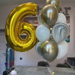 Helium foil digit and balloons in gold and white colors