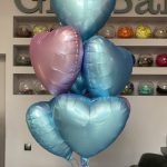 Bouquet of blue and pink hearts balloons