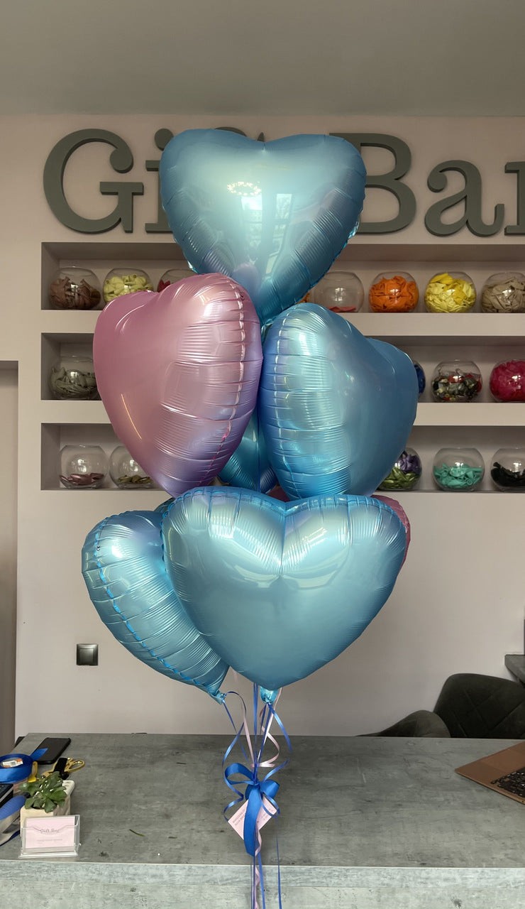 Bouquet of blue and pink hearts balloons