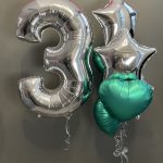 Bouquet of foil balloons in mint and silver colors