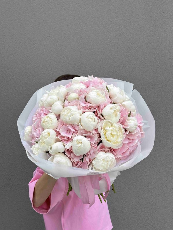 Bouquet of pink hydrangeas and white peonies