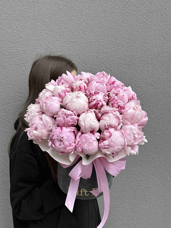 Pink peonies in flowerbox