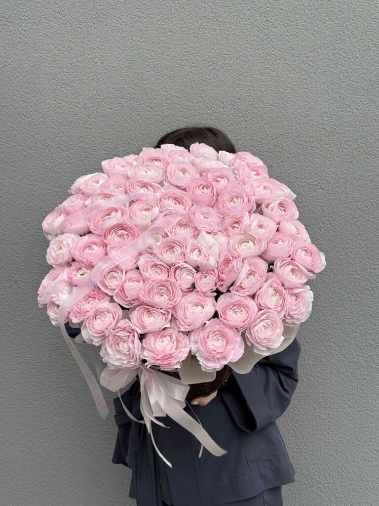 Pink ranunculus in a basket
