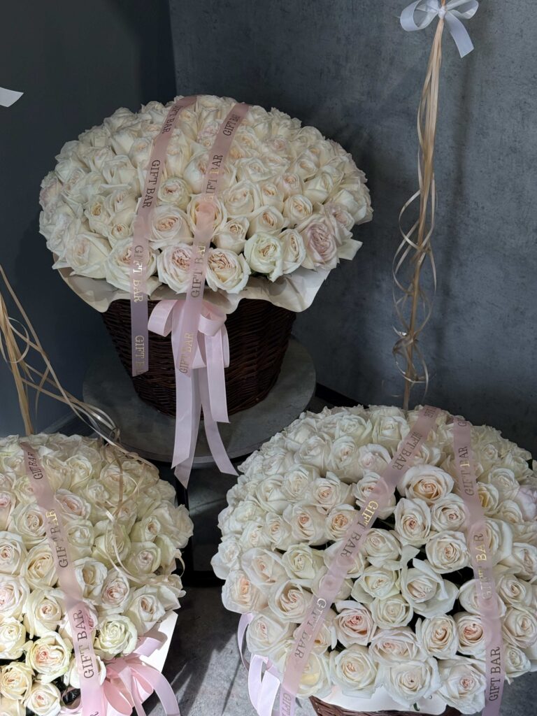 Basket of roses White O Hara