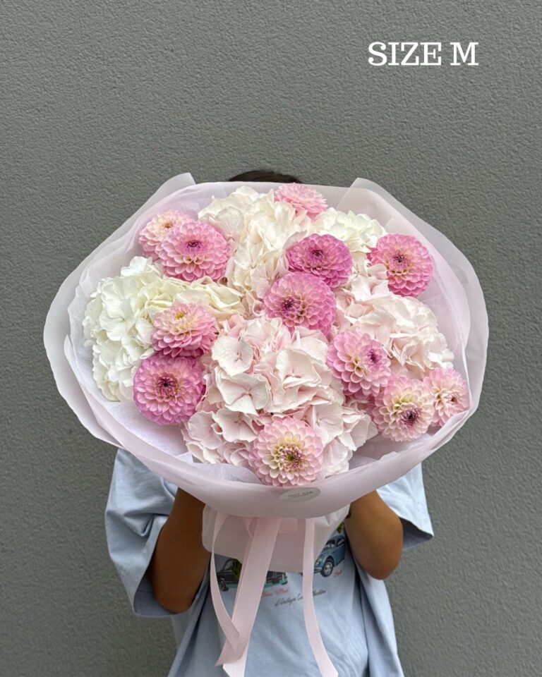Bouquet of pink dahlias and white hydrangeas
